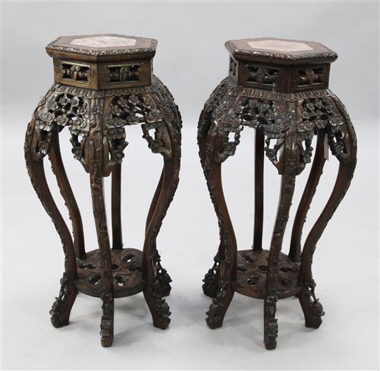 A pair of Chinese hongmu and rouge marble inset hexagonal stands, late 19th century, H.78cm